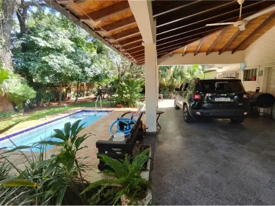Land for sale with house in Fernando de la Mora 4