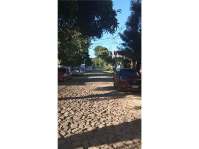 Terreno à venda com construção para demolir em Lambaré 3