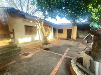 Terreno à venda com construção em Villa Elisa 2
