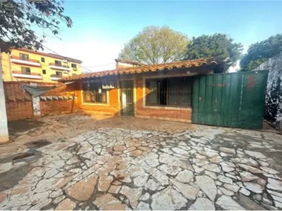 Terreno à venda com construção em Villa Elisa 4