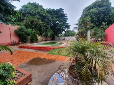 Terreno à venda com piscina e quincho em Ñemby 4