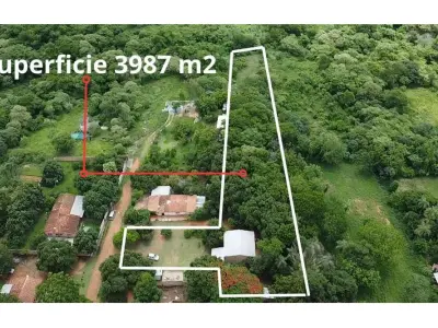 Terreno à venda com galpão habitável em Itauguá 3