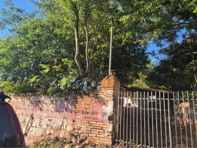 Terreno à venda com casa em Mariano Roque Alonso 4