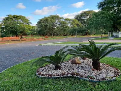 Terreno à venda em condomínio fechado em Villa Elisa 2