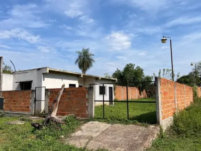 Terreno à venda em Capiatá com construção 3