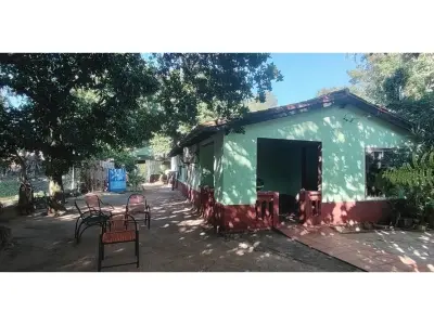 Terreno à venda em Limpio com casa para reformar 2