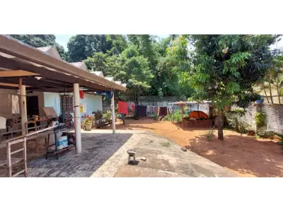 Terreno à venda em Luque com casa para reformar 4