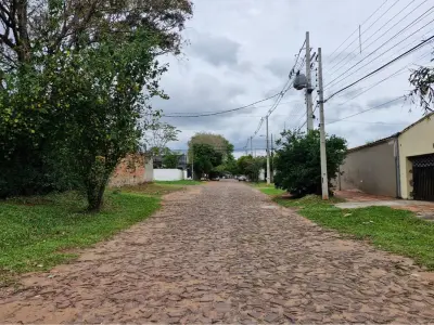 Terreno à venda em Sol de América, Villa Elisa 3
