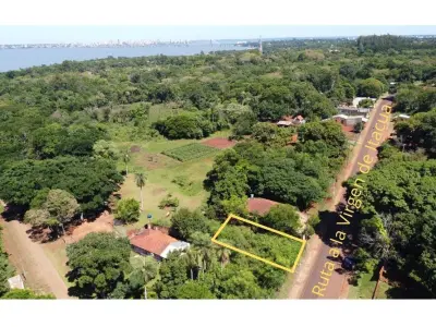 Terreno en venta sobre asfalto camino a Itacua 3