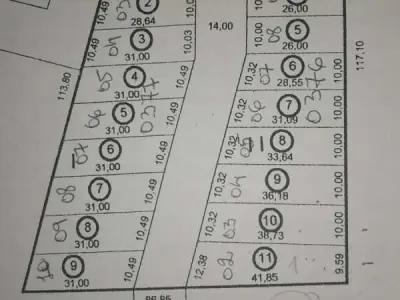 Terreno loteado à venda no centro de Guarambaré, Central 2
