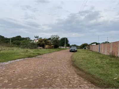 Terrenos à venda em Ypané com saída de rua a rua 4